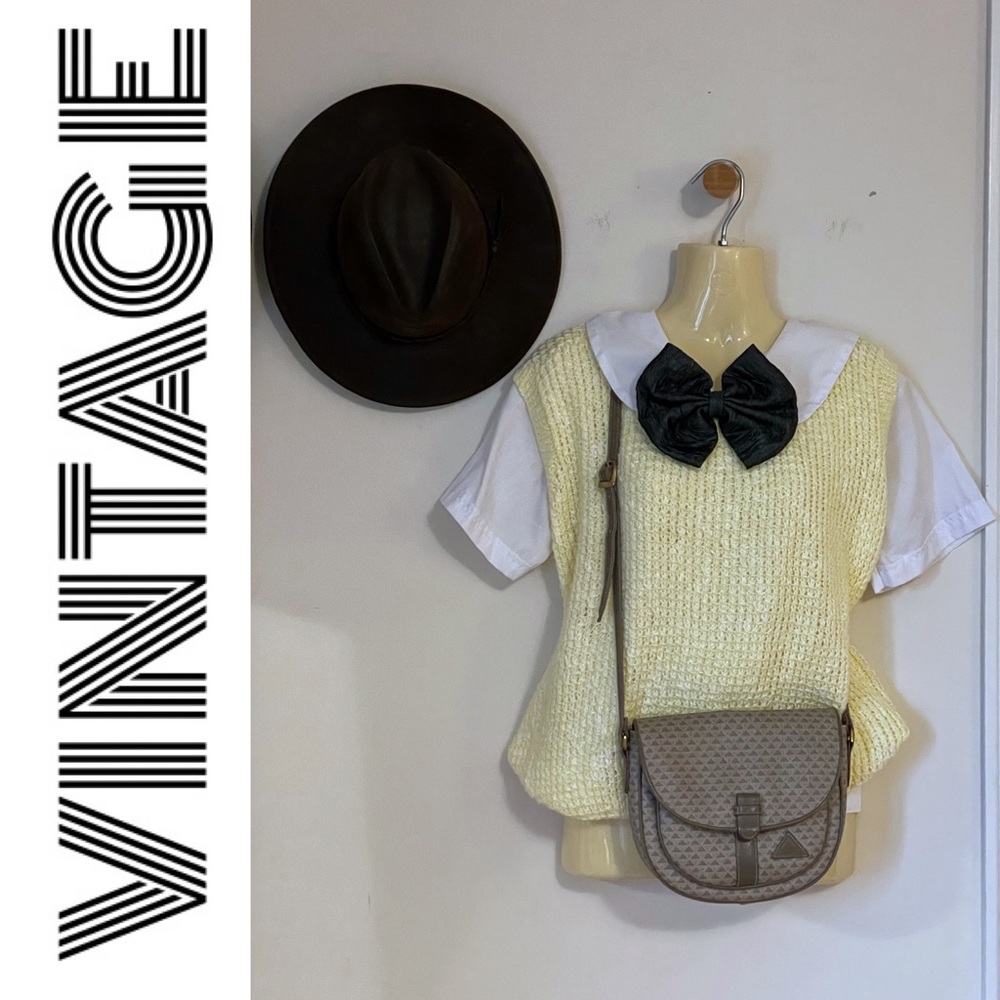 Vintage hand knit soft yellow oversized scoop neck sweater vest